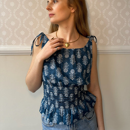 blue and white floral tie shoulder top